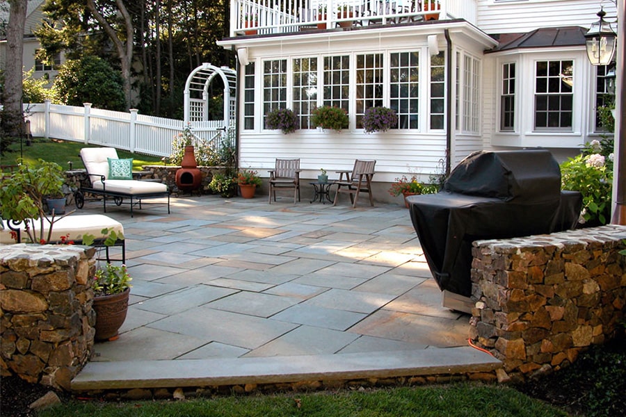 Beautiful paver patio and stone wall project in Weston, MA