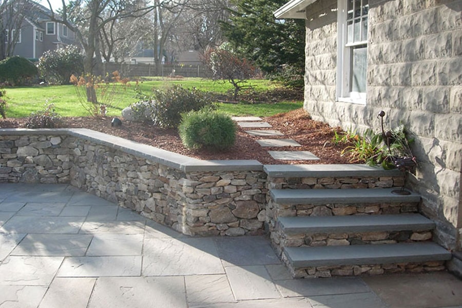 Stone patio, wall, and steps project in Weston, MA