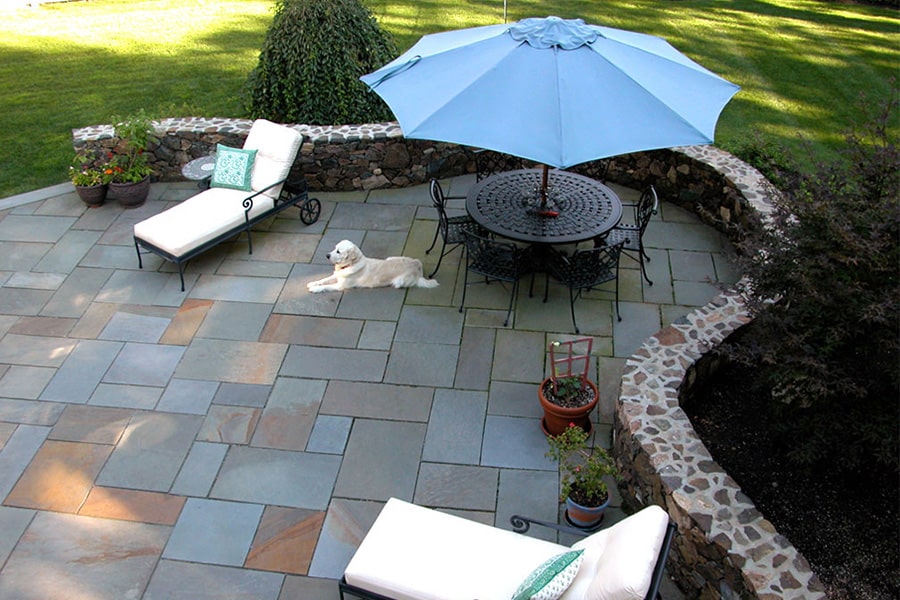 Paver patio and stone wall project in Weston, MA